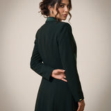 NAKHLAH long blazer from a rear three-quarter angle, showing the back and sleeve construction.
