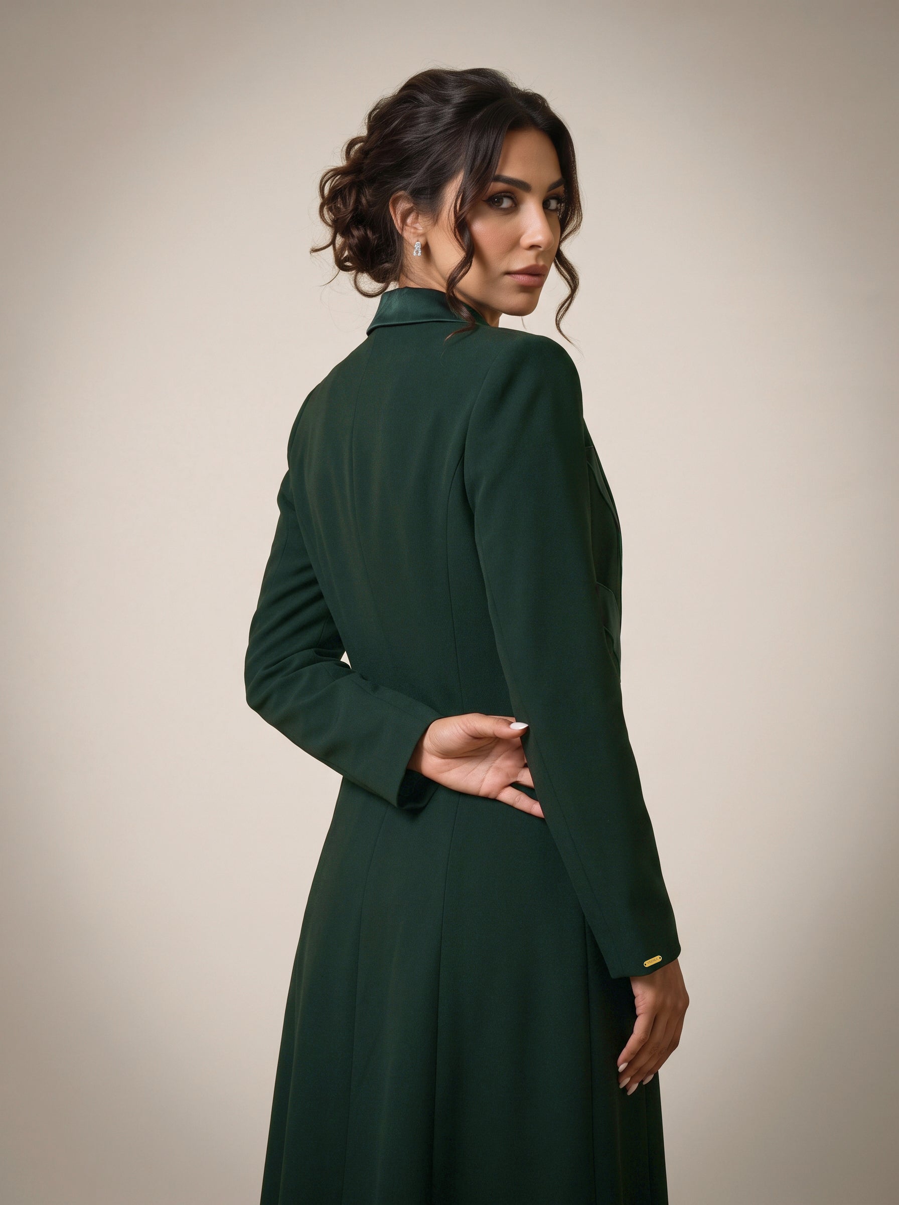 NAKHLAH blazer in Deep Saudi Green, rear three-quarter view.