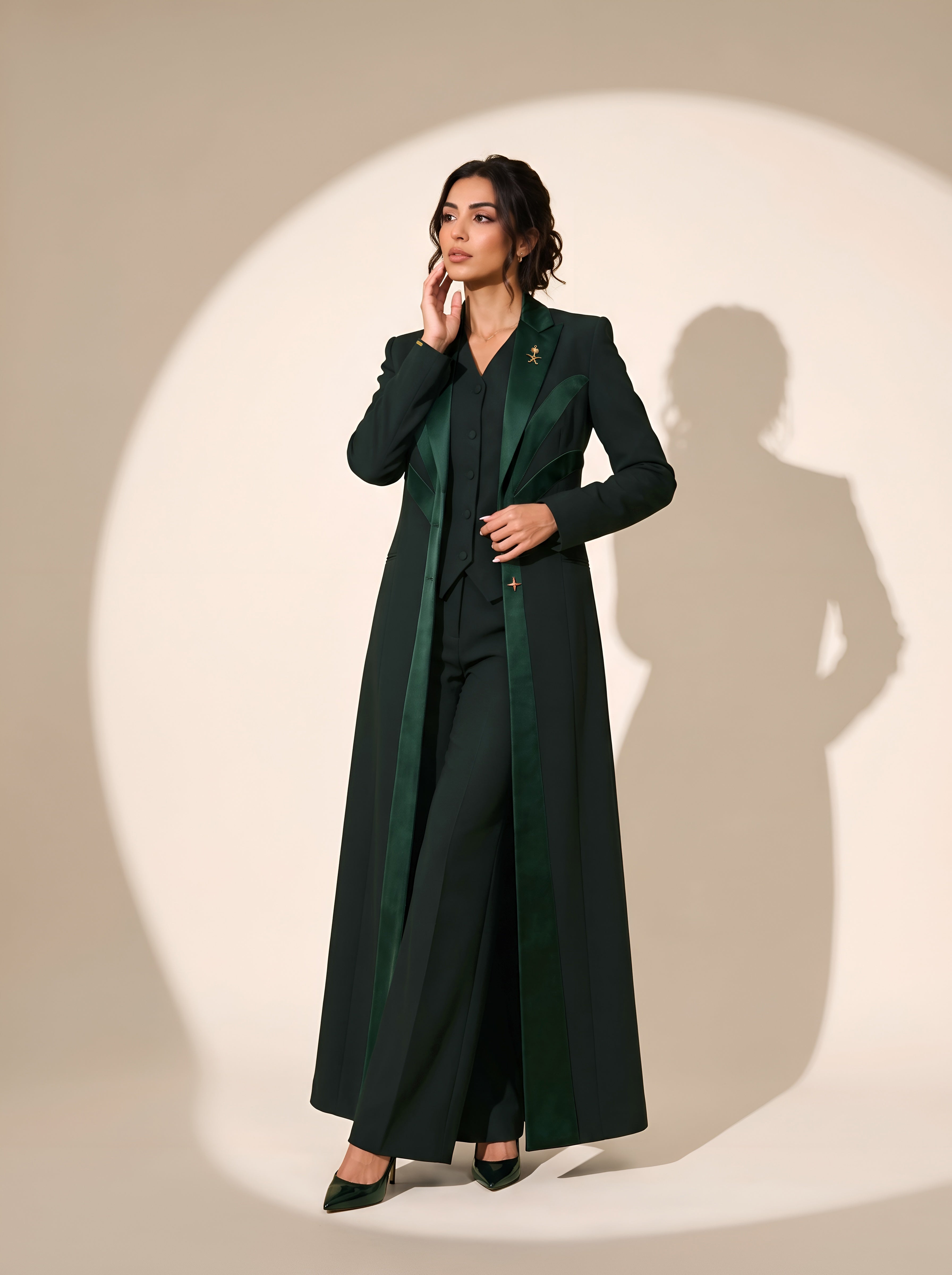 NAKHLAH long blazer in a full-length editorial pose with palm-inspired green silk lines.