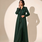 NAKHLAH blazer in Deep Saudi Green, full-length editorial pose.