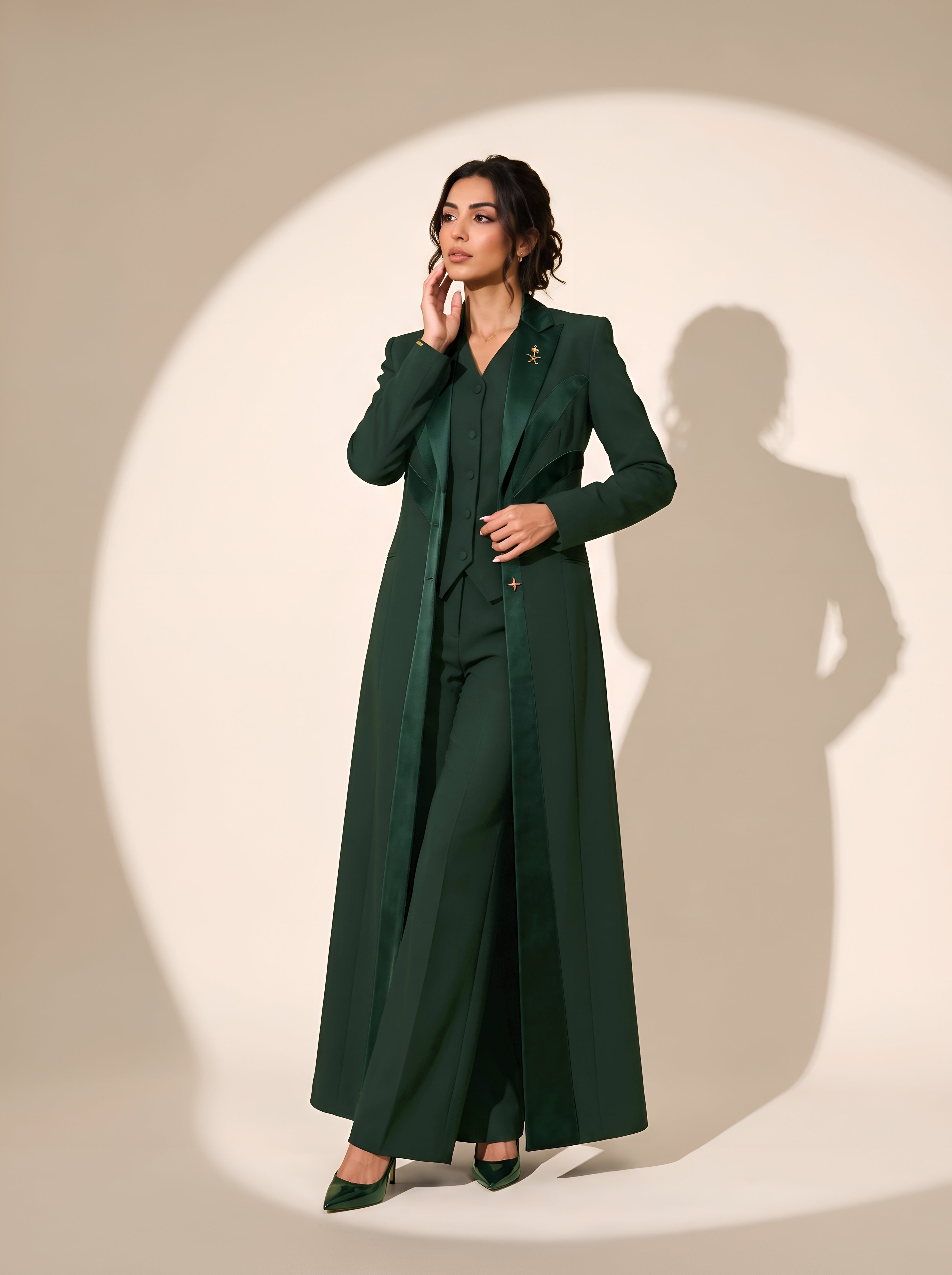 NAKHLAH blazer in Deep Saudi Green, full-length editorial pose.