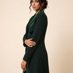 NAKHLAH long blazer in a three-quarter view showing the palm-inspired silk lines and tailored shape.