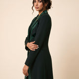 NAKHLAH long blazer in a three-quarter view showing the palm-inspired silk lines and tailored shape.