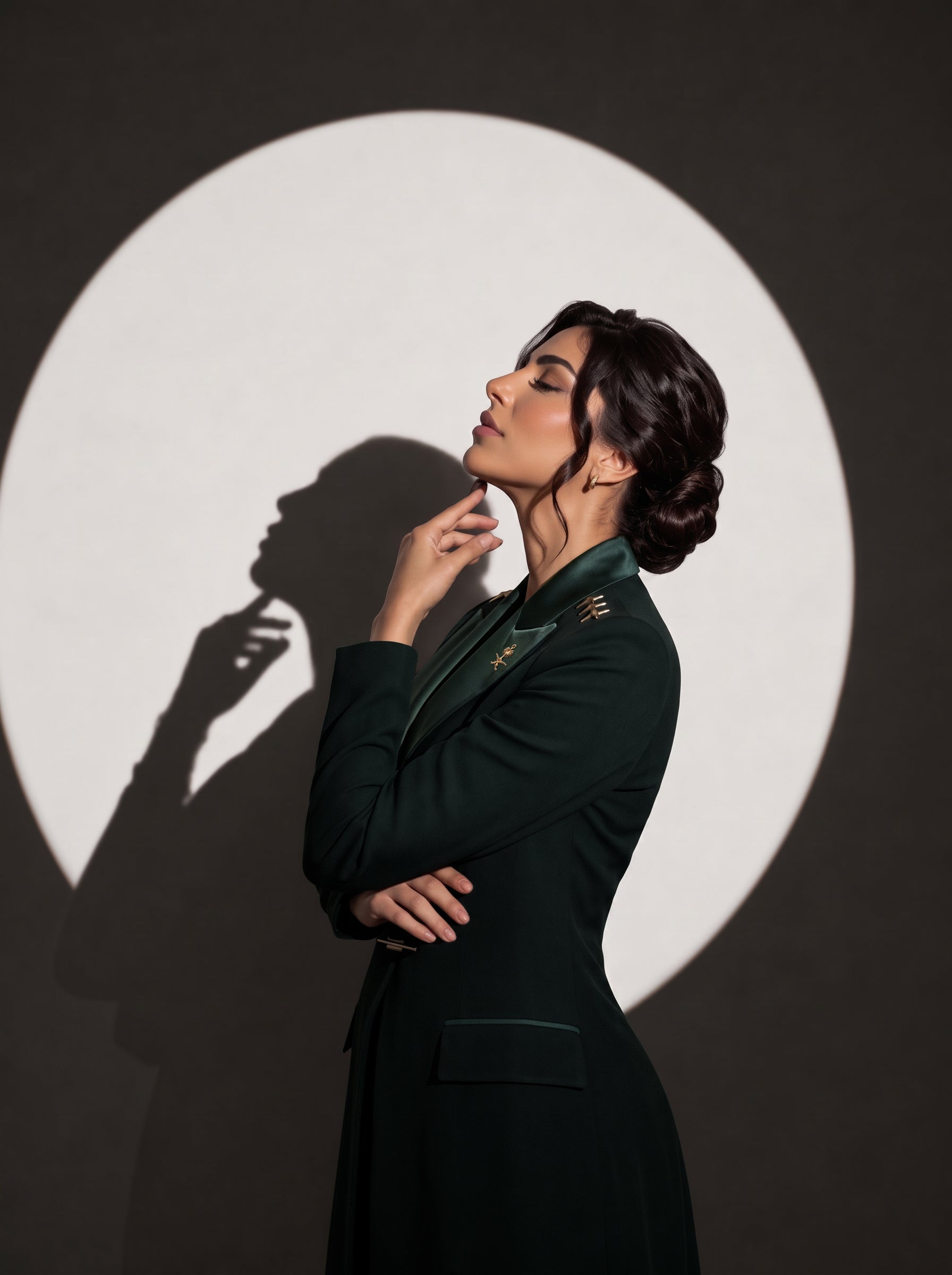 GLORY Deep Saudi Green blazer, editorial side portrait.
