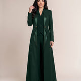 TERRA blazer in Deep Saudi Green, front view with curved detailing.