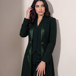 TERRA open-front editorial portrait showing curved green silk trim, the coordinating vest and gold-tone hardware.