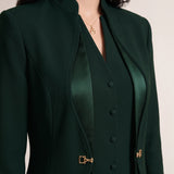 TERRA upper-front detail with standing collar and curved silk trim.