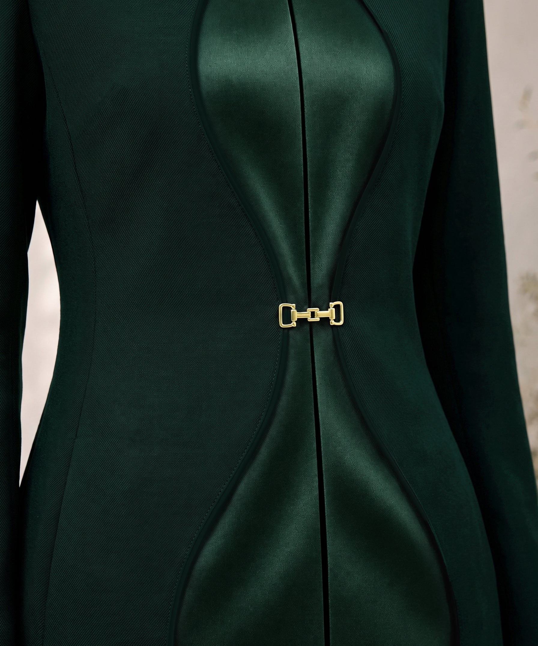 TERRA Deep Saudi Green blazer, waist detail with curved silk panels.