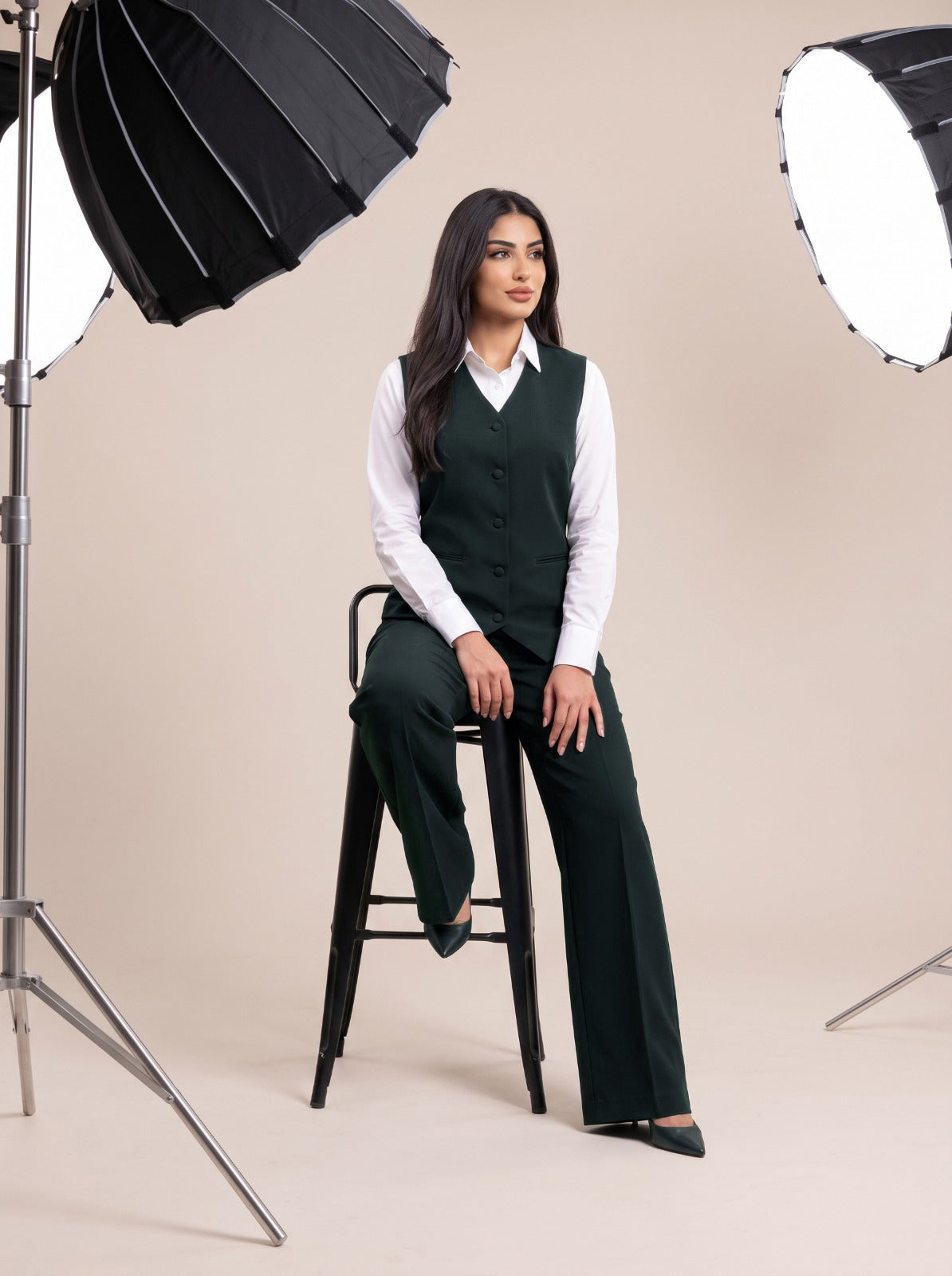 WAQAR formal set in Deep Saudi Green, rear three-quarter view.