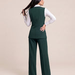 WAQAR formal set in Saudi Green, full-length editorial pose.