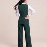 WAQAR formal set in Saudi Green, full-length editorial pose.