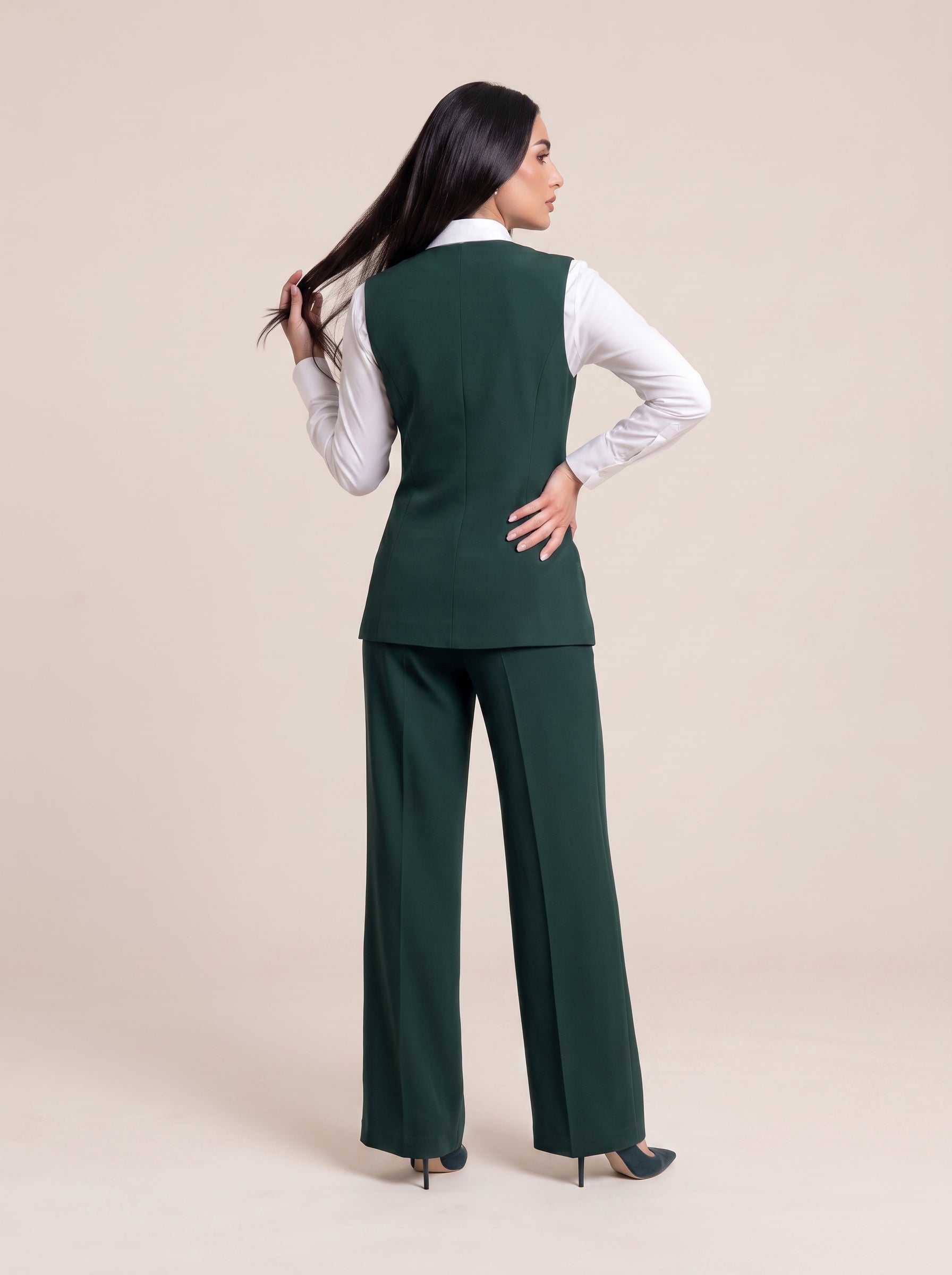 WAQAR formal set in Saudi Green, full-length editorial pose.