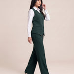 WAQAR formal set in Saudi Green, side view with wide-leg trousers.