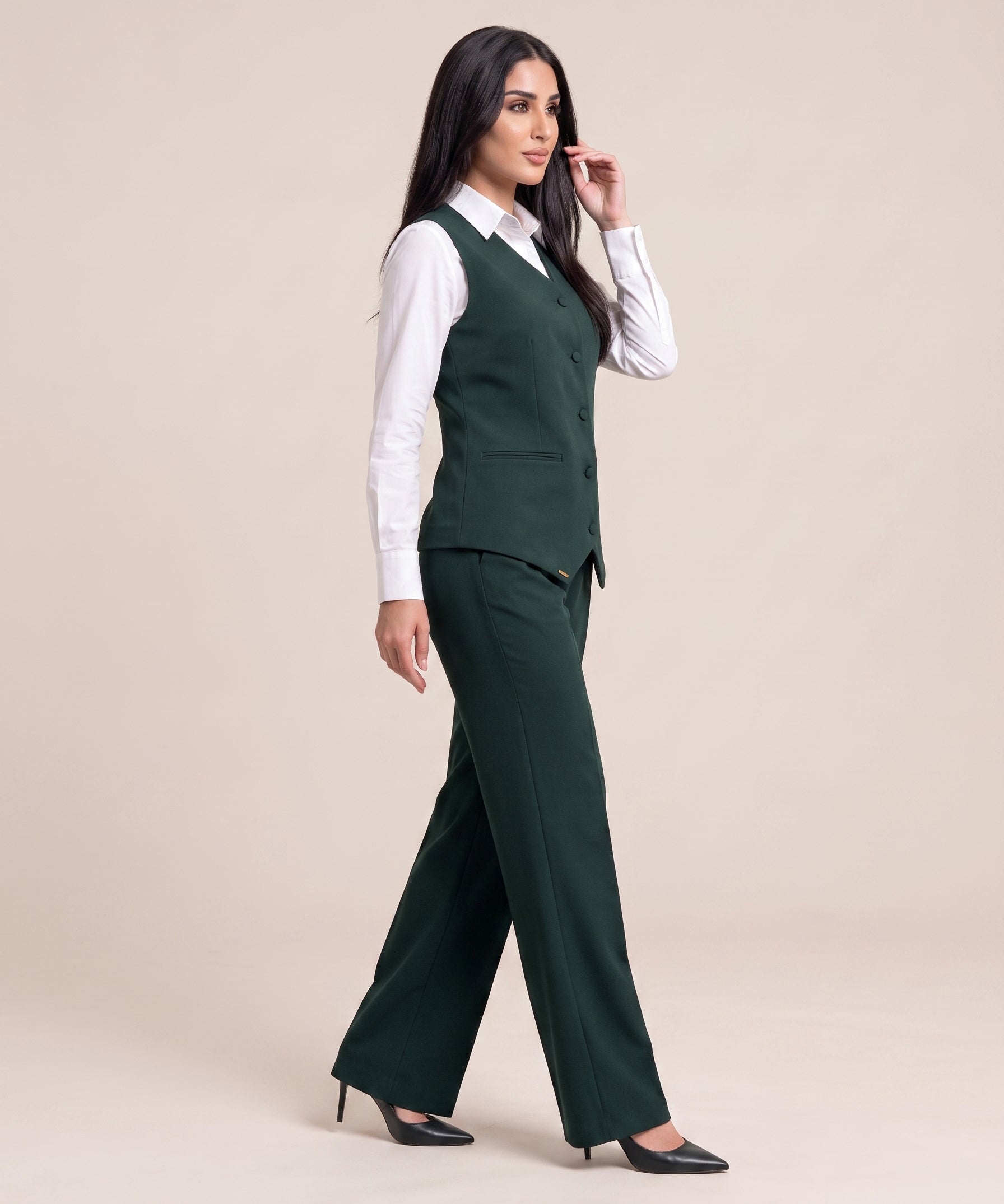 WAQAR formal set in Saudi Green, side view with wide-leg trousers.